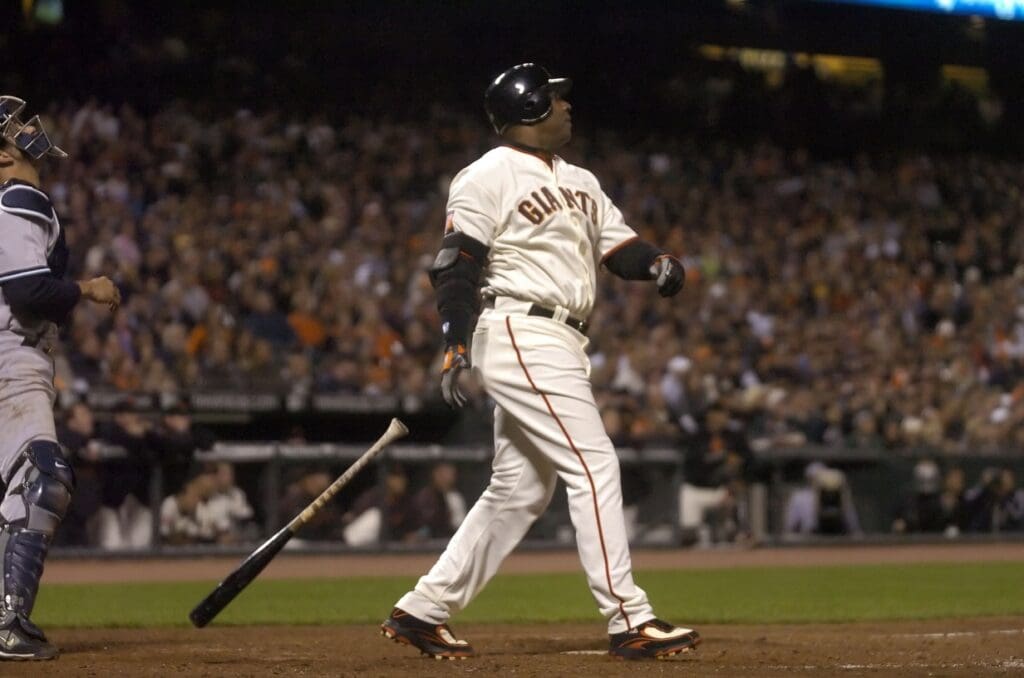 June 22, 2007; San Francisco, CA, USA; San Francisco Giants left fielder Barry Bonds (25) hits his 749th homerun off of New York Yankees relief pitcher Scott Proctor (not pictured) during the 8th inning at AT&T Park in San Francisco, CA. Bonds is seven homeruns away from breaking the all-time homerun record currently held by Hank Aaron.