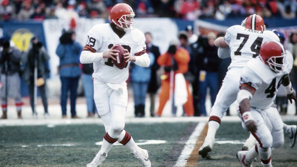 Jan 9, 1988; Cleveland, OH, USA; FILE PHOTO; Cleveland Browns quarterback Bernie Kosar (19) in action against the Indianapolis Colts during the 1987 AFC Divisional Playoff Game at Cleveland Stadium. The Browns defeated the Colts 38-21.