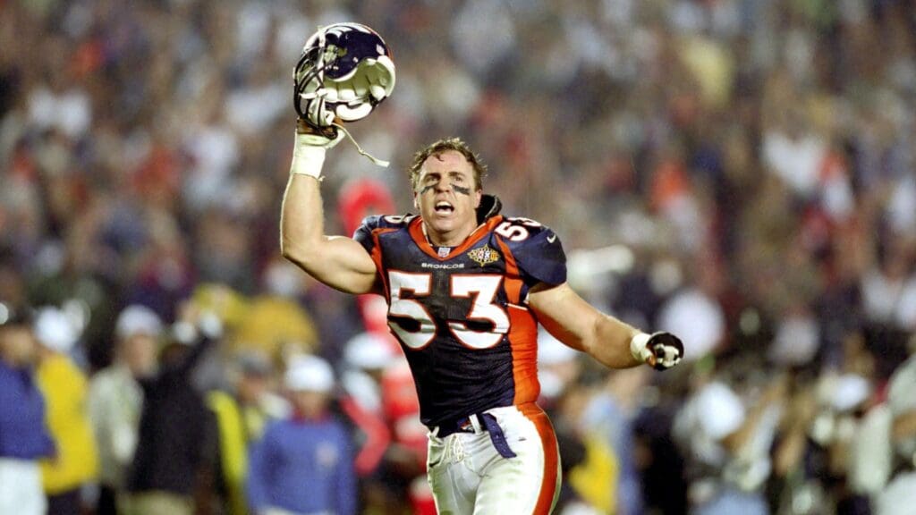 Jan 25, 1998; San Diego, CA, USA; FILE PHOTO; Denver Broncos Linebacker #53 BILL ROMANOWSKI celebrates the victory against the Green Bay Packers during Super Bowl XXXII at Qualcomm Stadium. The Broncos defeated the Packers 31-24 giving the Broncos their first Super Bowl victory
