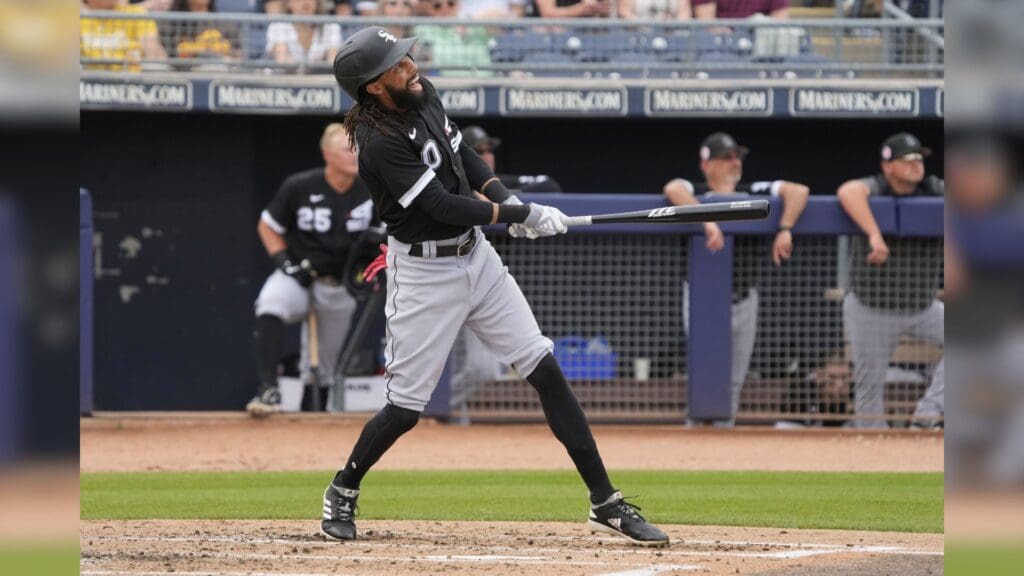 Mar 11, 2023; Peoria, Arizona, USA; Chicago White Sox centerfielder Billy Hamilton (0) hits against the San Diego Padres in the third inning at Peoria Sports Complex.