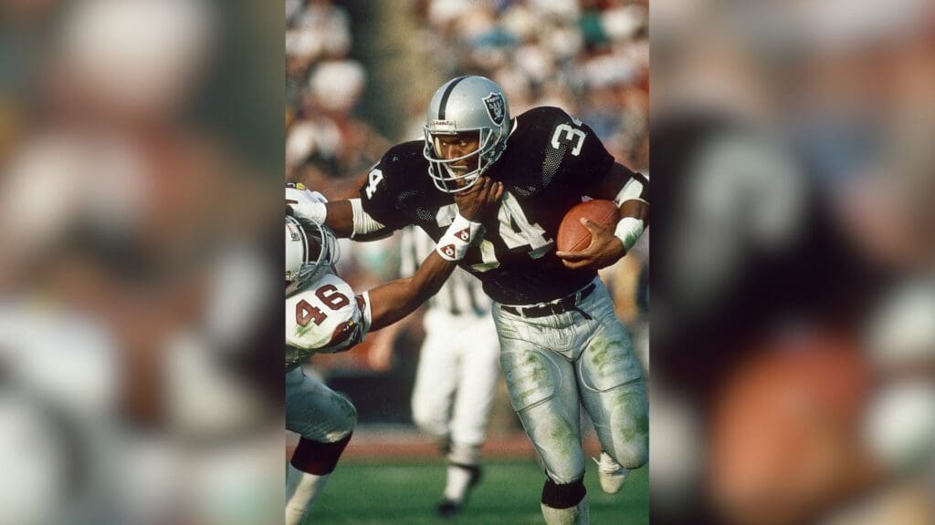 Dec 10, 1989; Los Angeles, CA, USA; FILE PHOTO; Los Angeles Raiders running back Bo Jackson (34) in action against Phoenix Cardinals safety Tim McDonald (46) at Los Angeles Memorial Coliseum.
