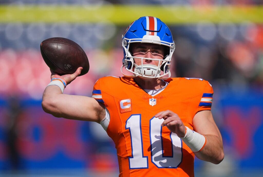 Oct 6, 2024; Denver, Colorado, USA; Denver Broncos quarterback Bo Nix (10) warms up before the game against the Las Vegas Raiders at Empower Field at Mile High