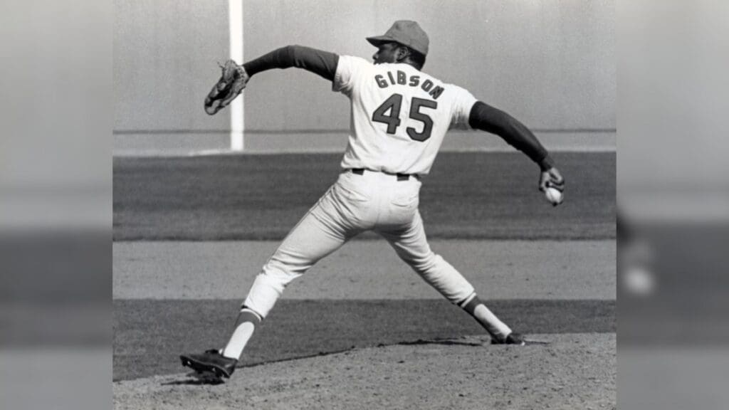 Oct 1968; St. Louis, MO, USA; FILE PHOTO; St. Louis Cardinals pitcher Bob Gibson (45) pitches during the 1968 World Series against the Detroit Tigers.