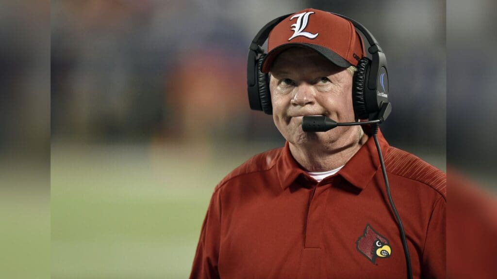 Sep 1, 2018; Orlando, FL, USA; Louisville Cardinals head coach Bobby Petrino paces the sidelines during their game against the Alabama Crimson Tide during the first quarter at Camping World Stadium.
