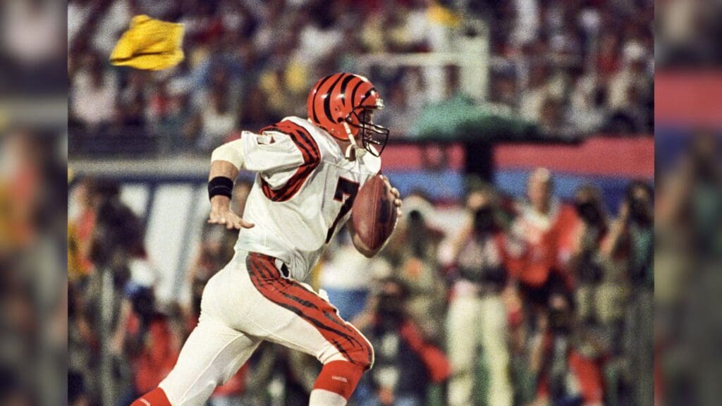 Jan 22, 1989; Miami, FL, USA; FILE PHOTO; Cincinnati Bengals quarterback Boomer Esiason (7) carries the ball against the San Francisco 49ers during Super Bowl XXIII at Joe Robbie Stadium. The 49ers defeated the Bengals 20-16.