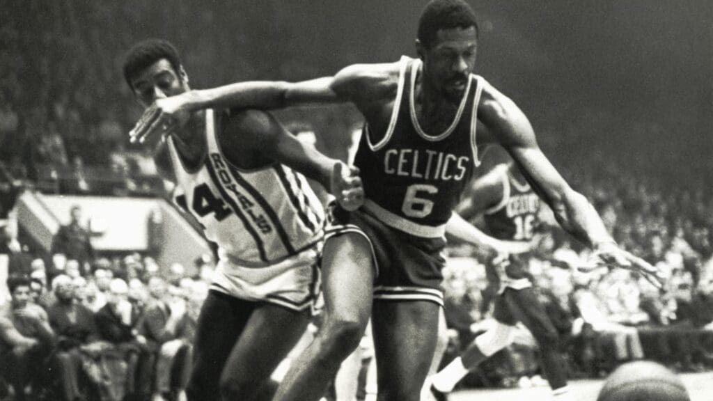 Unknown date; Cincinnati, OH, USA; FILE PHOTO; Boston Celtics center Bill Russell (6) fights for a loose ball against Cincinnati Royals guard Oscar Robertson (14) at Cincinnati Gardens.