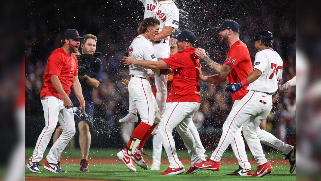 Jun 24, 2024; Boston, Massachusetts, USA; Boston Red Sox left fielder Jarren Duran (16) celebrates with teammates after hitting a game winning RBI single during the ninth inning against the Toronto Blue Jays at Fenway Park.