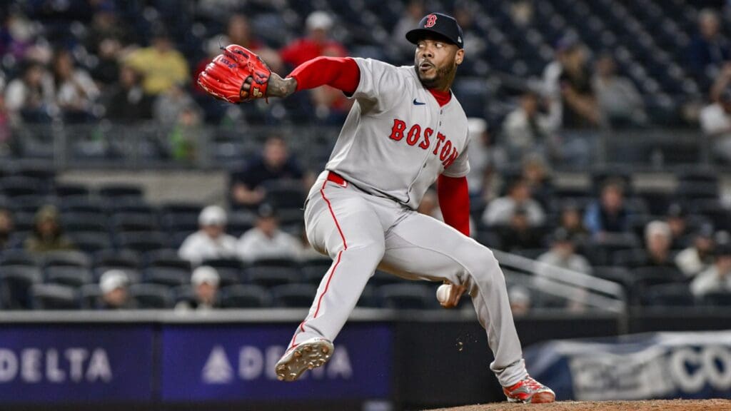 Boston Red Sox pitcher Aroldis Chapman (44) pitches against the New York Yankees during the ninth inning at Yankee Stadium.