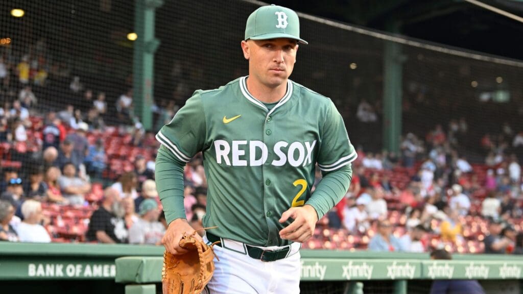 May 16, 2025; Boston, Massachusetts, USA; Boston Red Sox third baseman Alex Bregman (2) runs out of the dugout before the start of a game against the Atlanta Braves at Fenway Park.