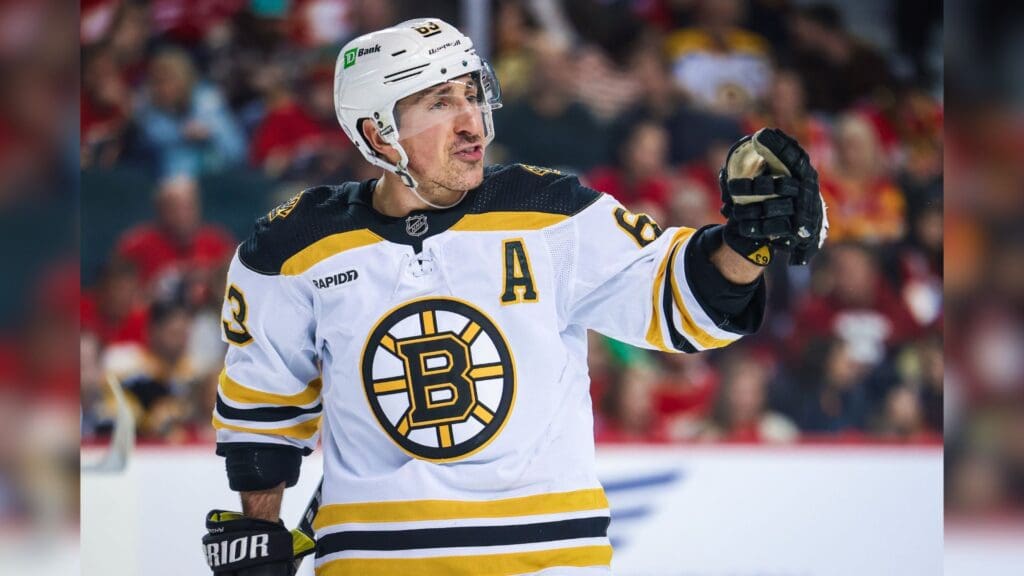 Feb 28, 2023; Calgary, Alberta, CAN; Boston Bruins left wing Brad Marchand (63) reacts during the second period against the Calgary Flames at Scotiabank Saddledome.