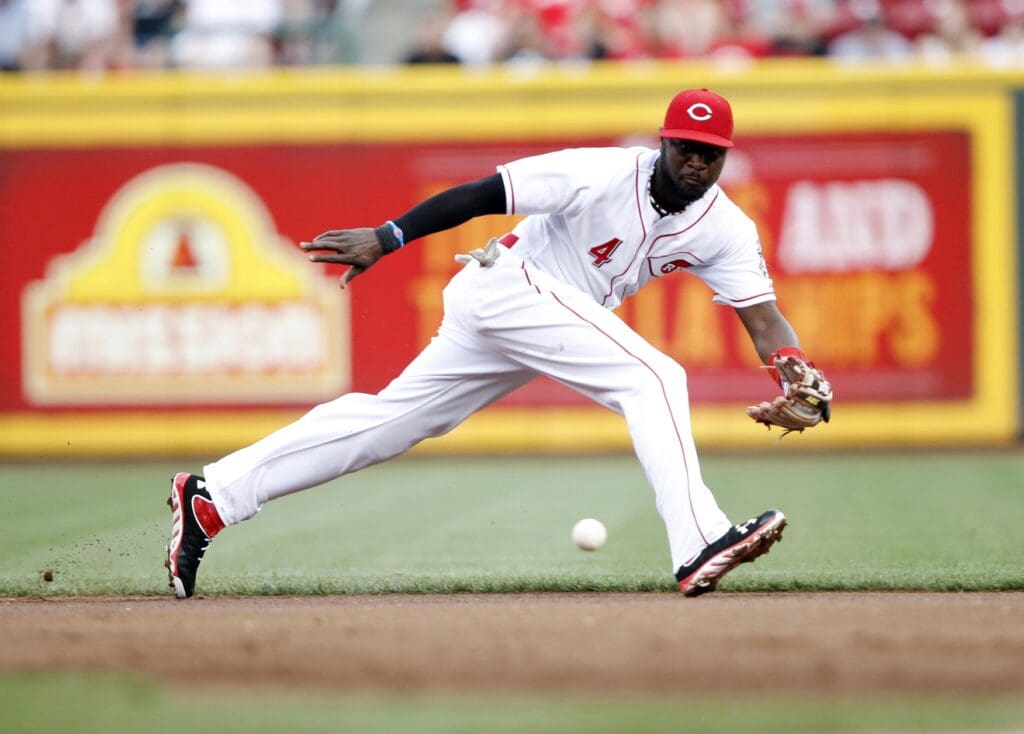 May 28, 2013; Cincinnati, OH, USA; Cincinnati Reds second baseman Brandon Phillips (4) makes a play during the first inning against the Cleveland Indians at Great American Ball Park.