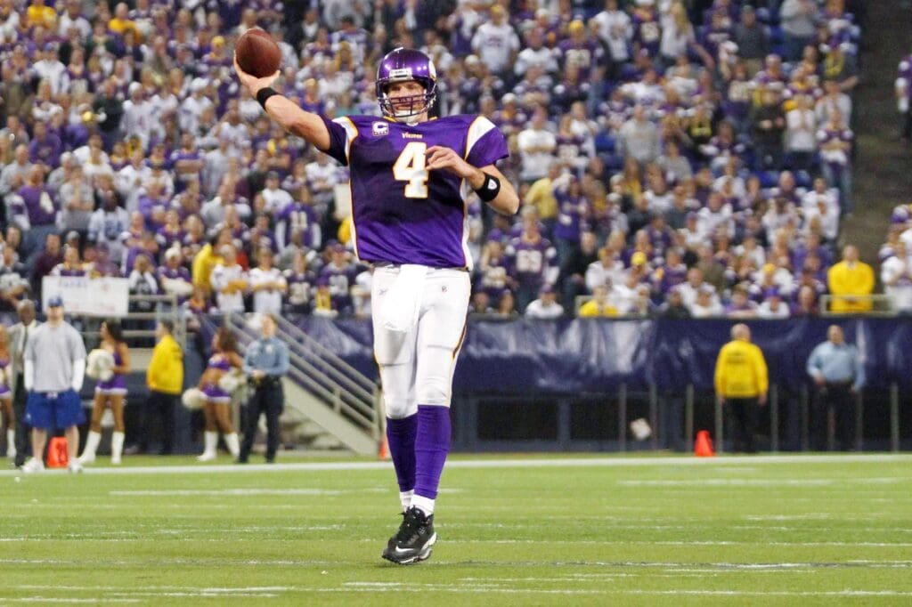 Jan 17, 2010; Minneapolis, MN, USA; Minnesota Vikings quarterback Brett Favre (4) throws a pass during the fourth quarter of the 2010 NFC divisional playoff game against the Dallas Cowboys at the Metrodome. The Vikings beat the Cowboys 34-3.
