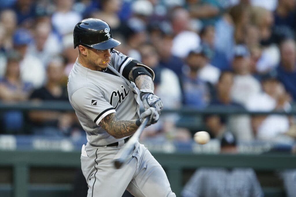 Jul 19, 2016; Seattle, WA, USA; Chicago White Sox second baseman Brett Lawrie (15) hits a solo homer against the Seattle Mariners during the second inning at Safeco Field.