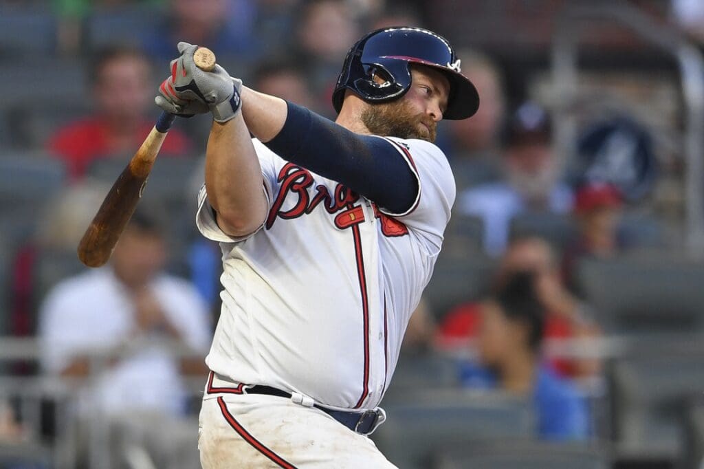 Oct 9, 2019; Atlanta, GA, USA; Atlanta Braves catcher Brian McCann (16) bats against the St. Louis Cardinal during game five of the 2019 NLDS playoff baseball series at SunTrust Park.