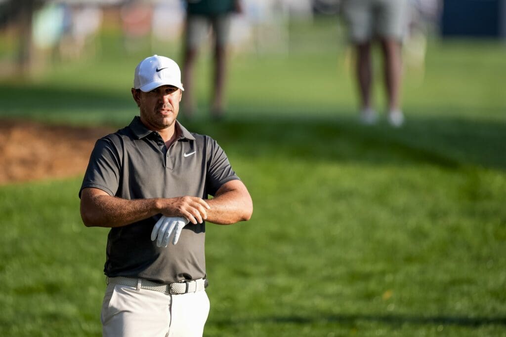 May 15, 2025; Charlotte, North Carolina, USA; Brooks Koepka looks down the tenth fairway during the first round of the PGA Championship golf tournament at Quail Hollow