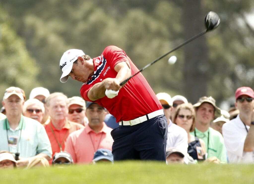Brooks Koepka hits his tee shot on the 1st hole during the first round of The Masters golf tournament at Augusta National Golf Club