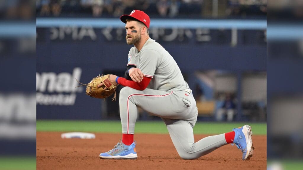 Jun 4, 2025; Toronto, Ontario, CAN; Philadelphia Phillies first baseman Bryce Harper (3) looks on during an injury delay in the ninth inning against the Toronto Blue Jays at Rogers Centre.