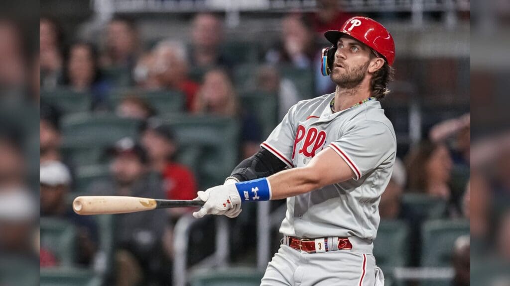 Sep 18, 2023; Cumberland, Georgia, USA; Philadelphia Phillies first baseman Bryce Harper (3) watches the ball after hitting a home run against the Atlanta Braves during the third inning at Truist Park.