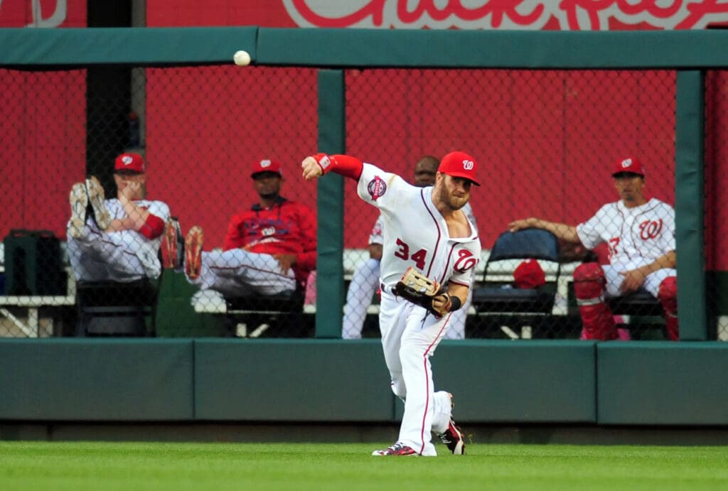 Jun 18, 2015; Washington, DC, USA; Washington Nationals outfielder Bryce Harper (34) throws the ball in the second inning against the Tampa Bay Rays at Nationals Park.