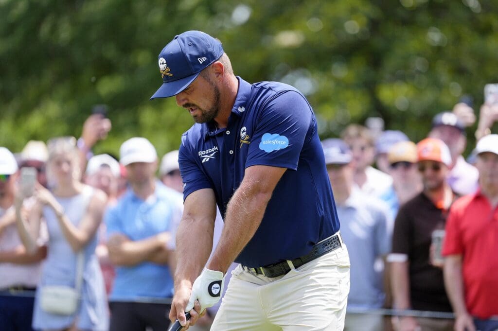 May 18, 2025; Charlotte, North Carolina, USA; Bryson DeChambeau tees off on the third hole during the final round of the PGA Championship golf tournament at Quail Hollow.
