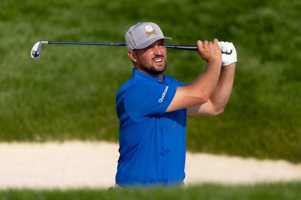Bryson DeChambeau plays a shot from a bunker on the ninth hole during a practice round for the U.S. Open golf tournament at Oakmont Country Club.