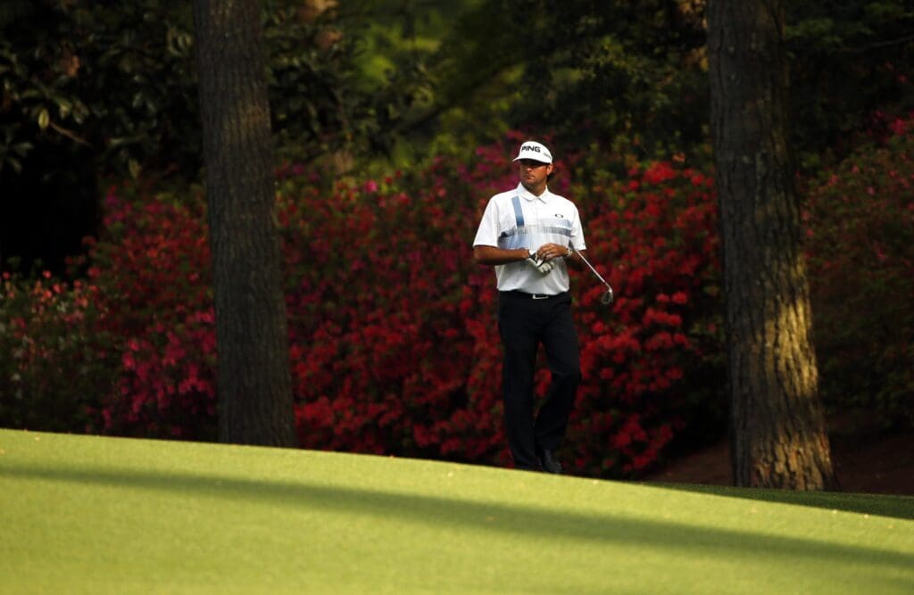 Apr 13, 2014; Augusta, GA, USA; Bubba Watson walks to the 13th green during the final round of the 2014 The Masters golf tournament at Augusta National Golf Club