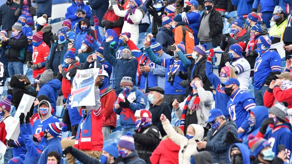 Jan 9, 2021; Orchard Park, New York, USA; Buffalo Bills fans celebrate a touchdown against the Indianapolis Colts in the first quarter at Bills Stadium.