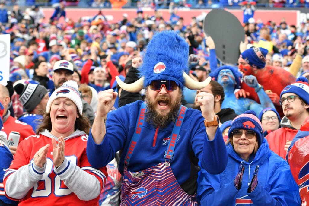 Dec 29, 2024; Orchard Park, New York, USA; Buffalo Bills fans celebrate a touchdown against the New York Jets in the second quarter at Highmark Stadium