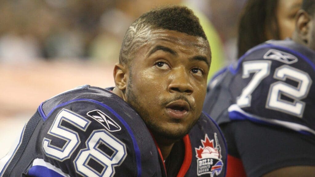 Aug 19, 2010; Toronto, ON, Canada; Buffalo Bills linebacker Aaron Maybin (58) looks on from the bench during the game against the Indianapolis Colts at the Rogers Centre. The Bills beat the Colts 34-21