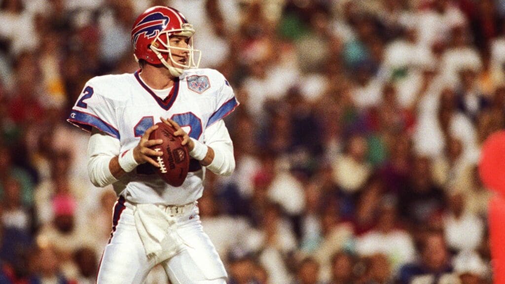 Jan 27, 1991; Tampa, FL, USA; FILE PHOTO; Buffalo Bills quarterback Jim Kelly (12) looks to pass the ball against the New York Giants during Super Bowl XXV at Tampa Stadium. The Giants defeated the Bills 19-20