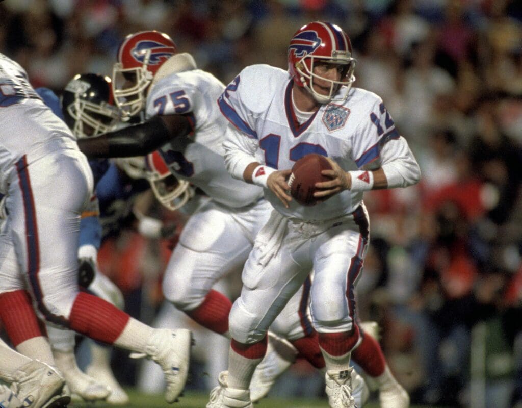 Jan 27, 1991; Tampa, FL, USA; FILE PHOTO; Buffalo Bills quarterback Jim Kelly (12) in action against the New York Giants during Super Bowl XXV at Tampa Stadium. The Giants defeated the Bills 20-19.