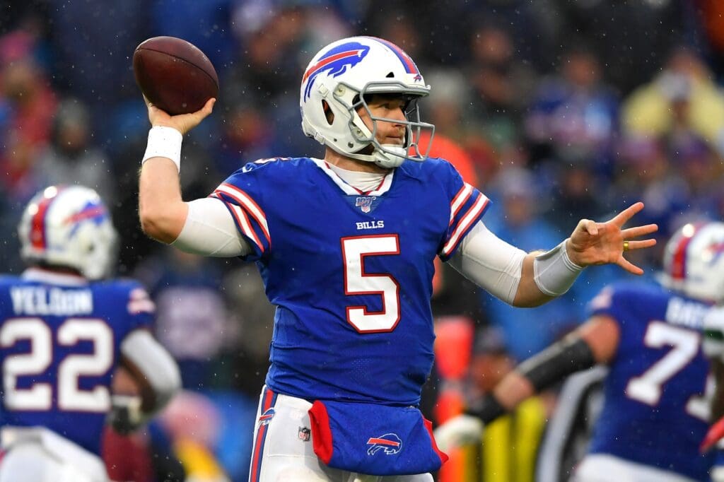 Dec 29, 2019; Orchard Park, New York, USA; Buffalo Bills quarterback Matt Barkley (5) passes the ball against the New York Jets during the fourth quarter at New Era Field
