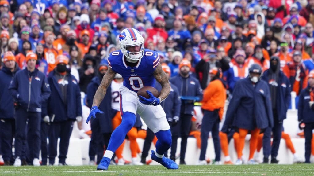 Jan 12, 2025; Orchard Park, New York, USA; Buffalo Bills wide receiver Keon Coleman (0) runs for a gain during the first quarter against the Denver Broncos in an AFC wild card game at Highmark Stadium.