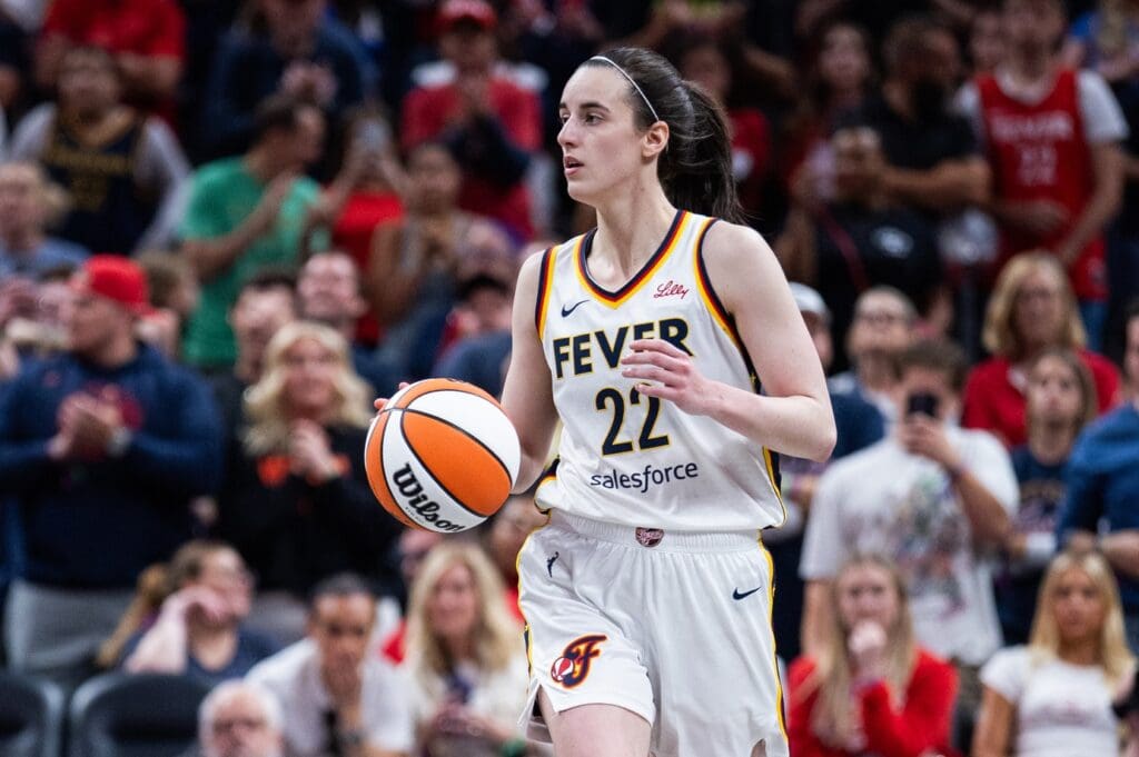 May 24, 2025; Indianapolis, Indiana, USA; Indiana Fever guard Caitlin Clark (22) dribbles the ball in the second half against the New York Liberty at Gainbridge Fieldhouse.
