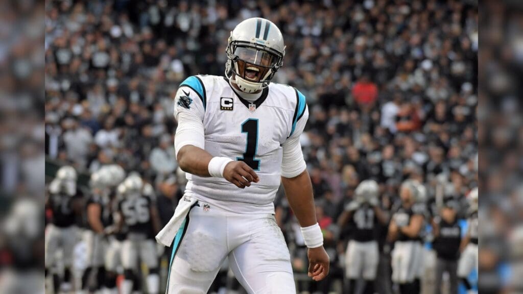 Nov 27, 2016; Oakland, CA, USA; Carolina Panthers quarterback Cam Newton (1) celebrates the touchdown scored by running back Jonathan Stewart (28) against the Oakland Raiders during the second half at Oakland-Alameda County Coliseum.