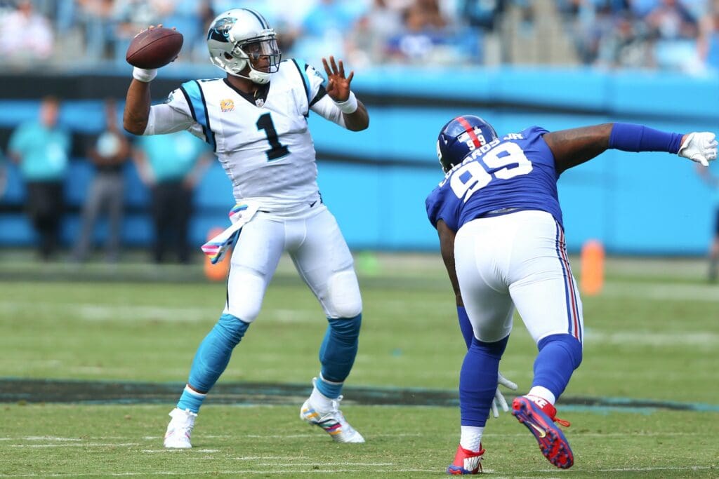 Oct 7, 2018; Charlotte, NC, USA; Carolina Panthers quarterback Cam Newton (1) throws the ball in the second quarter against the New York Giants at Bank of America Stadium