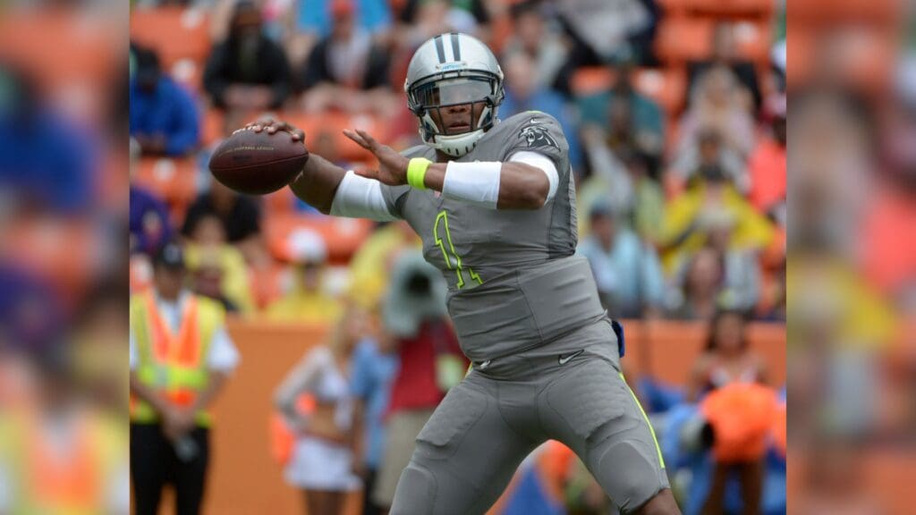January 26, 2014; Honolulu, HI, USA; Team Sanders quarterback Cam Newton (1) throws a pass during the 2014 Pro Bowl at Aloha Stadium.