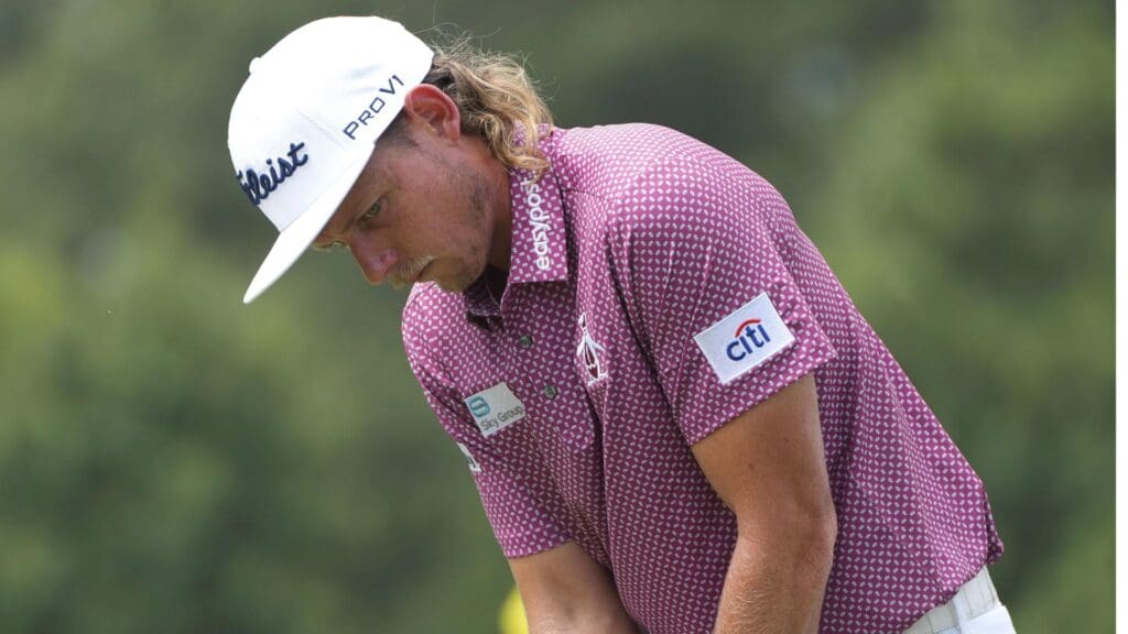 Aug 14, 2022; Memphis, Tennessee, USA; Cam Smith keeps an eye on his putt during the final round of the FedEx St. Jude Championship golf tournament at TPC Southwind.