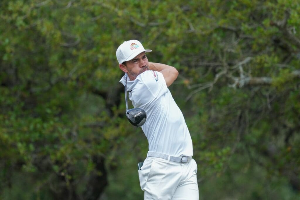 Camilo Villegas watches his shot off the tenth tee during the second round of the Valero Texas Open golf tournament.