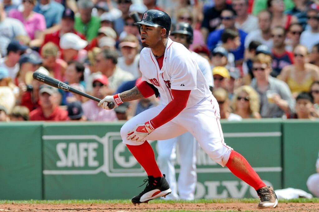 August 5, 2012; Boston, MA, USA; Boston Red Sox left fielder Carl Crawford (13) bats during the third inning against the Minnesota Twins at Fenway Park.