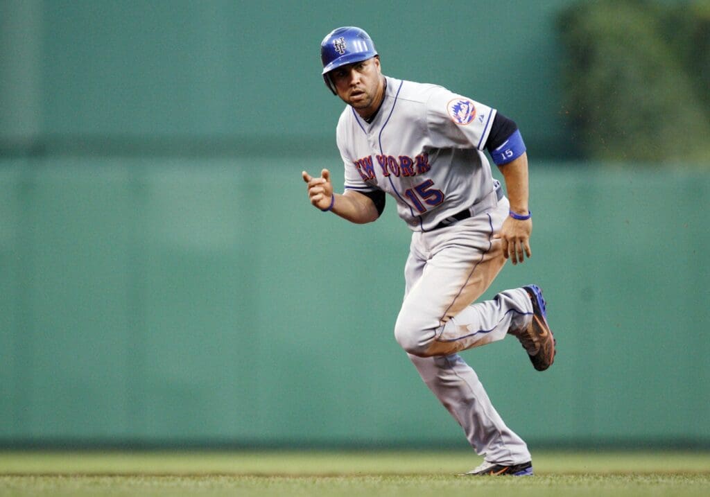 June 11, 2011; Pittsburgh,PA, USA: New York Mets right fielder Carlos Beltran (15) steals third base against the Pittsburgh Pirates during the fifth inning at PNC Park. The Pirates won 3-2.