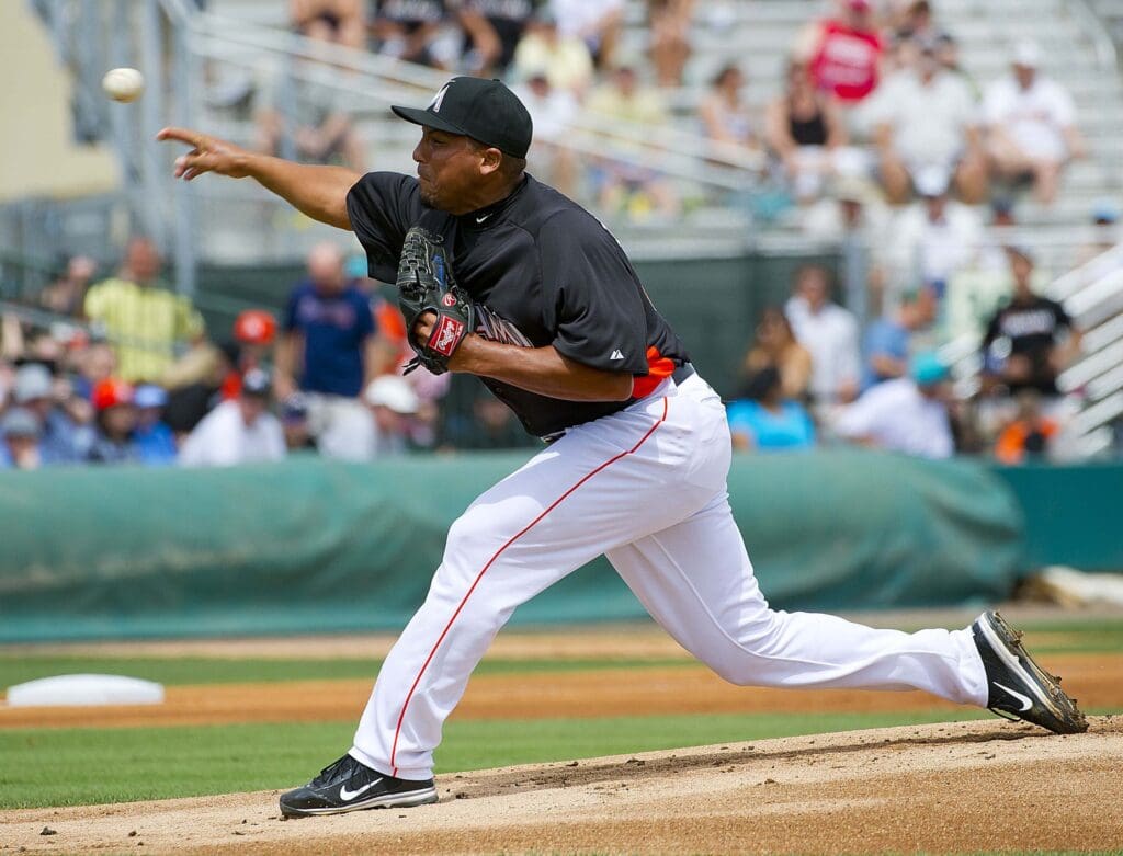Mar 13, 2012; Jupiter, FL. USA; Miami Marlins starting pitcher Carlos Zambrano (38) delivers a pitch against the Atlanta Braves at Roger Dean Stadium.