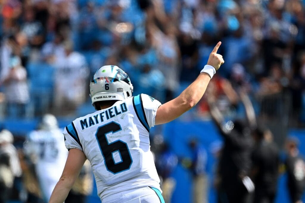Sep 11, 2022; Charlotte, North Carolina, USA; Carolina Panthers quarterback Baker Mayfield (6) reacts after throwing a touchdown pass in the fourth quarter at Bank of America Stadium.