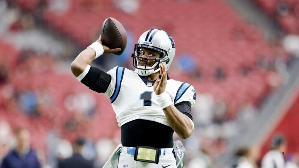 Nov 14, 2021; Glendale, Arizona, USA; Carolina Panthers quarterback Cam Newton (1) warms up prior to the game against the Arizona Cardinals at State Farm Stadium.