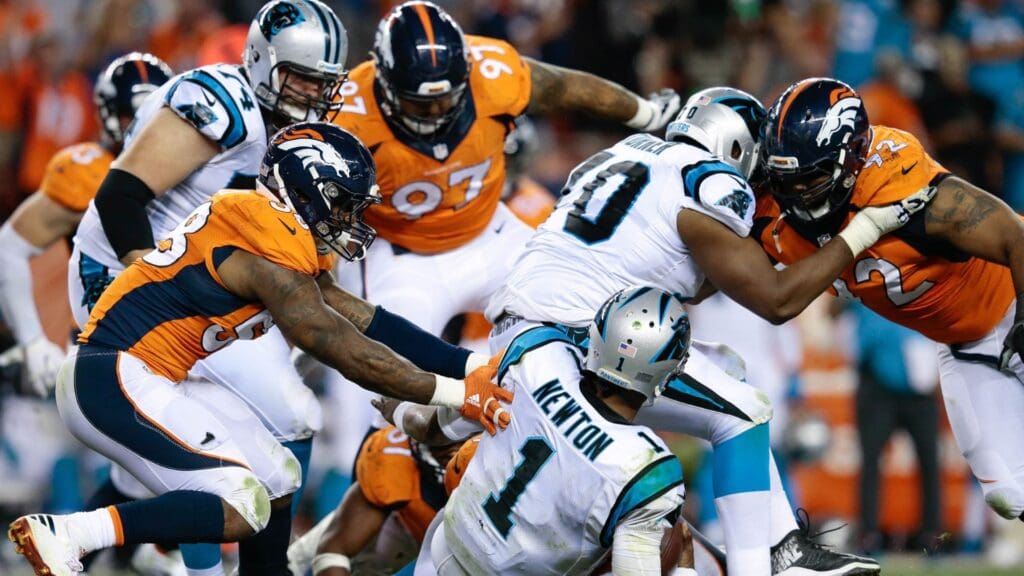 Sep 8, 2016; Denver, CO, USA; Carolina Panthers quarterback Cam Newton (1) is sacked and pushed down by Denver Broncos outside linebacker Von Miller (58) in the fourth quarter at Sports Authority Field at Mile High.