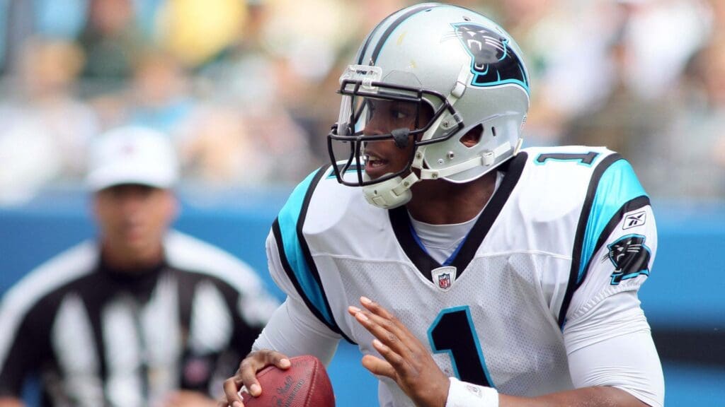 Sep 18, 2011; Charlotte, NC, USA; Carolina Panthers quarterback Cam Newton (1) looks to pass the ball during the second quarter against the Green Bay Packers at Bank of America Stadium. The Packers defeated the Panthers 30-23.
