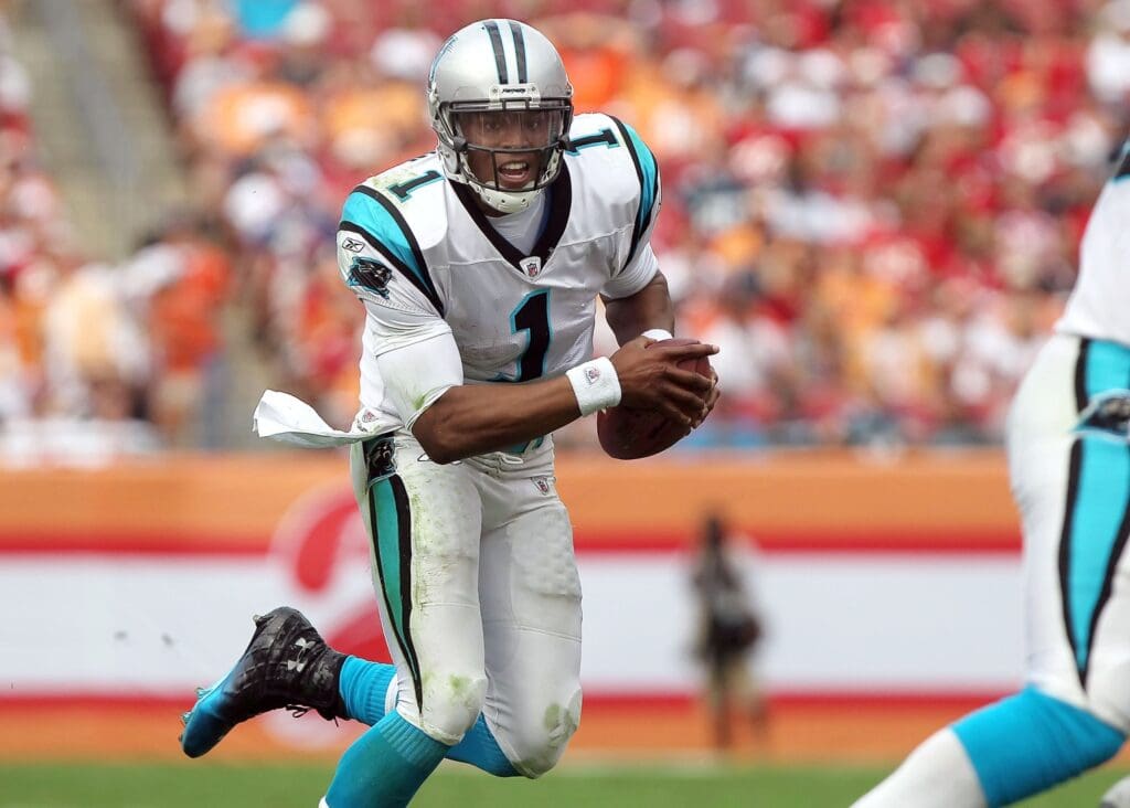 December 4, 2011; Tampa, FL, USA; Carolina Panthers quarterback Cam Newton (1) runs with the ball during the second half against the Tampa Bay Buccaneers at Raymond James Stadium. Carolina won 38-19.