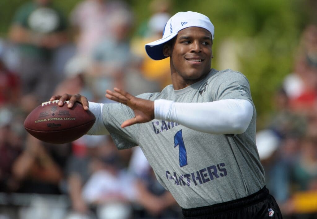 Jan 26, 2012; Honolulu, HI, USA; Carolina Panthers quarterback Cam Newton (1) throws a pass at NFC practice for the 2012 Pro Bowl at the Joint Base Pearl Harbor-Hickam.