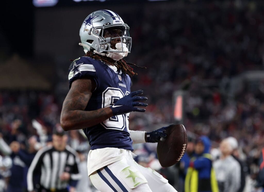 Jan 16, 2023; Tampa, Florida, USA; Dallas Cowboys wide receiver CeeDee Lamb (88) makes a touchdown catch against the Tampa Bay Buccaneers in the second half during the wild card game at Raymond James Stadium