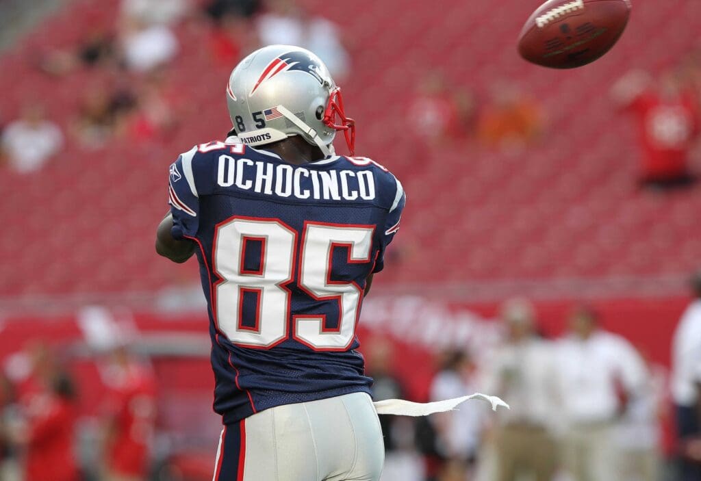 August 18, 2011; Tampa, FL, USA; New England Patriots wide receiver Chad Ochocinco (85) catches the ball prior to the game against the Tampa Bay Buccaneers at Raymond James Stadium.